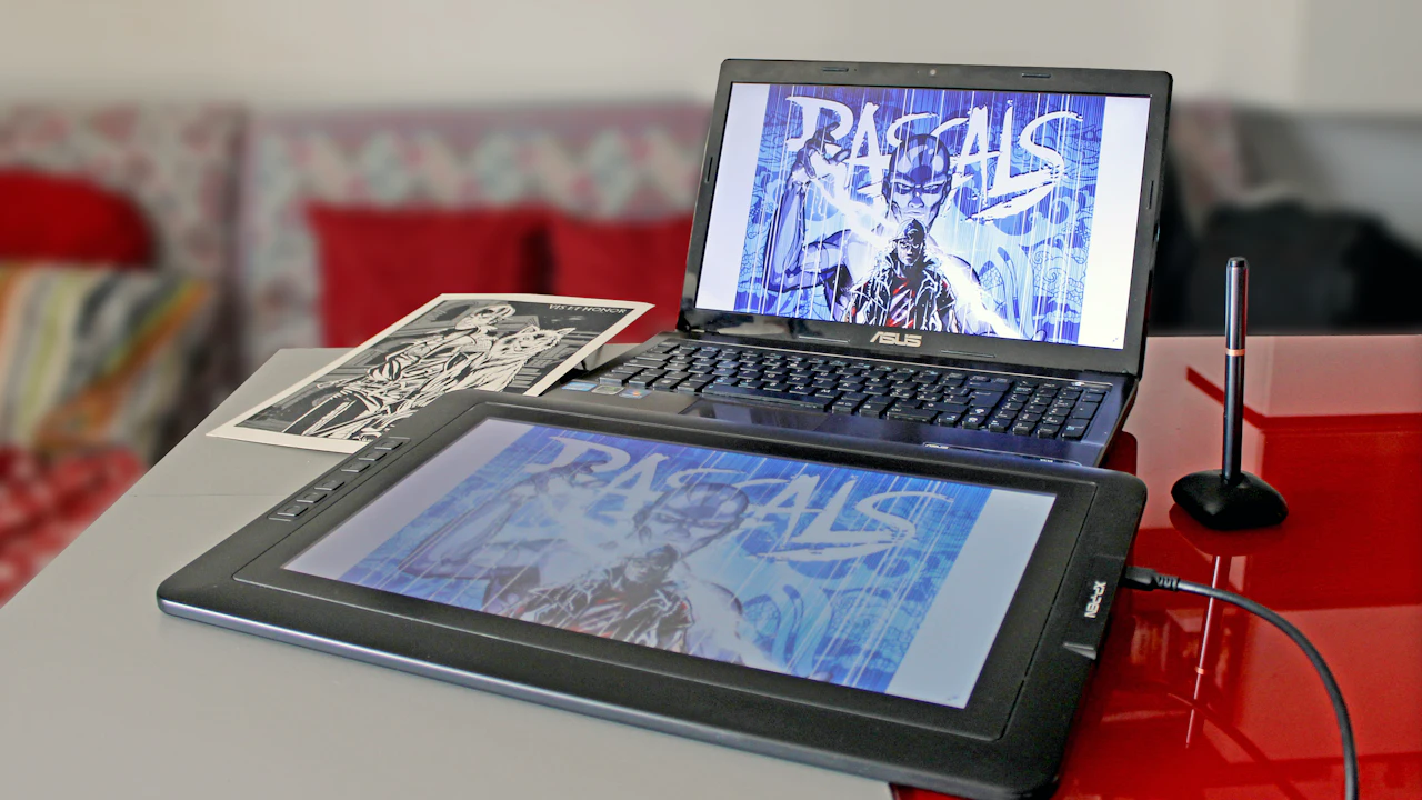 A drawing tablet and a laptop