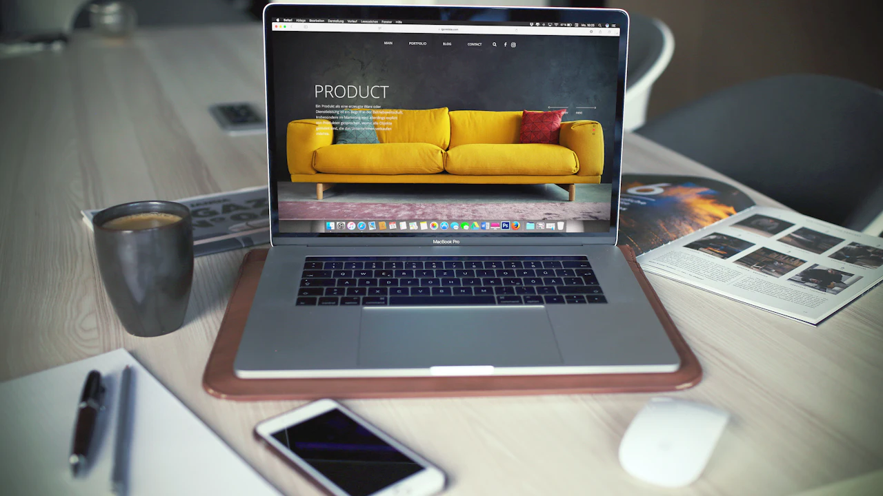 A laptop showing a website